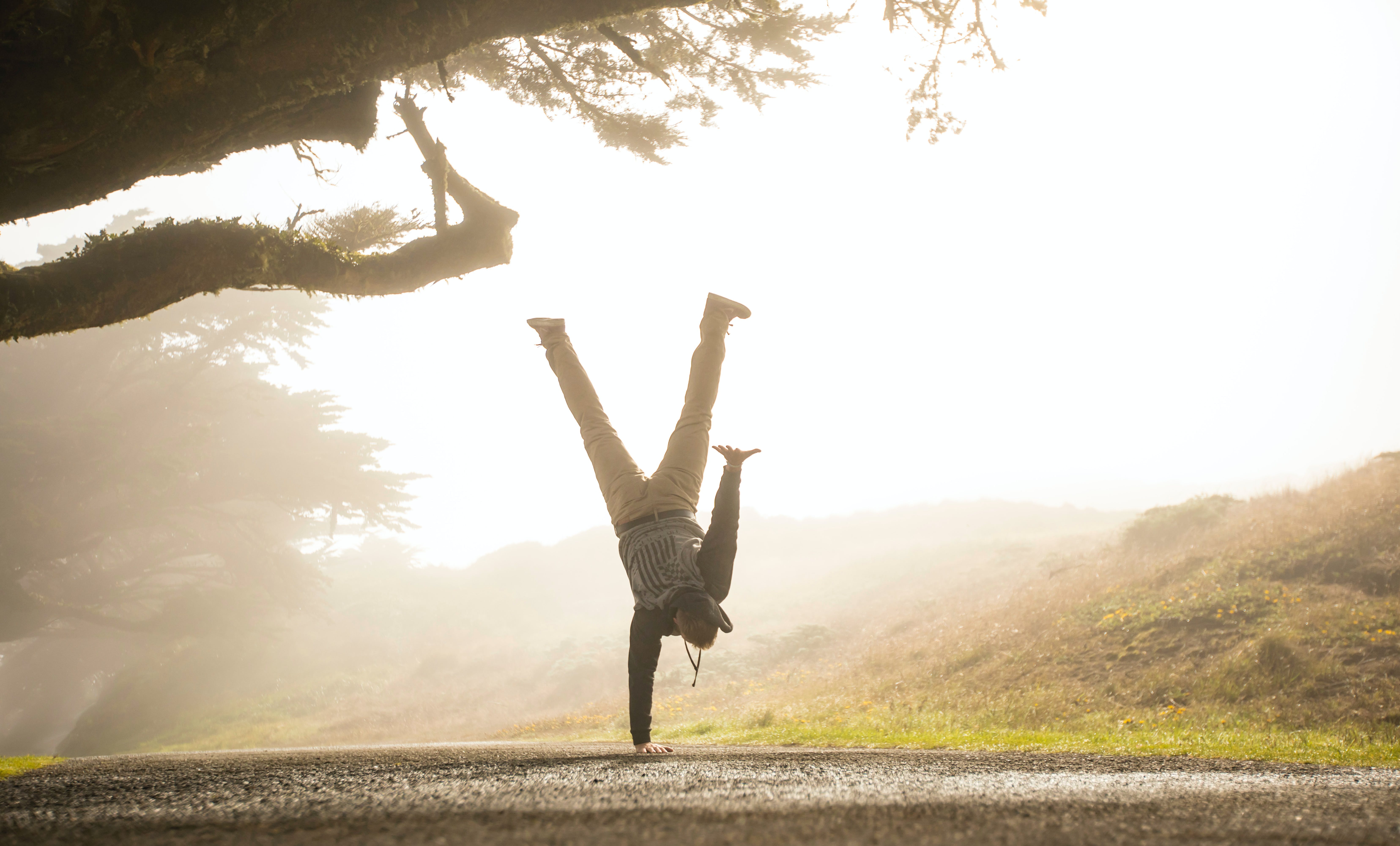 Man doing a handstand outdoors