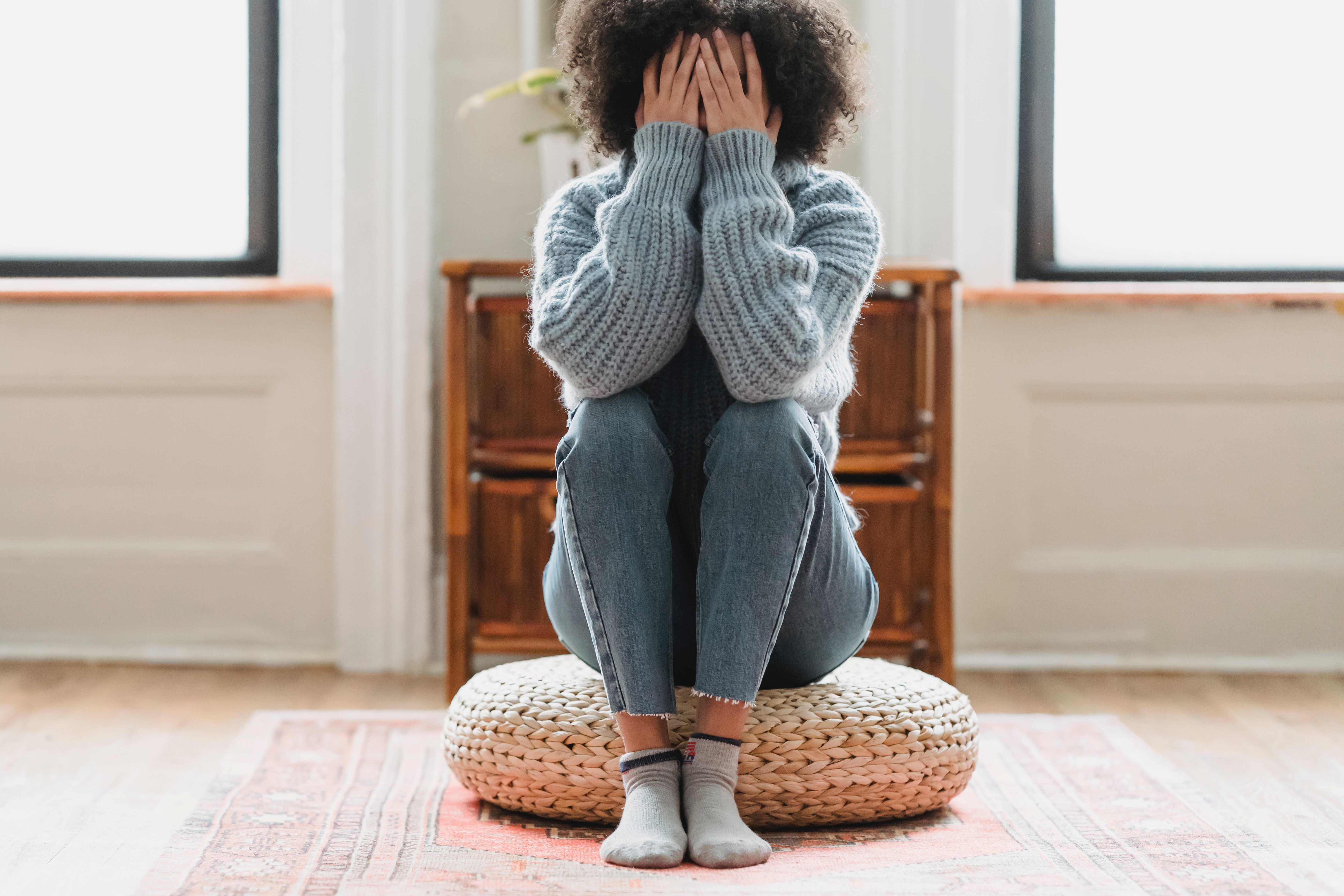 Woman visibly upset, stressed