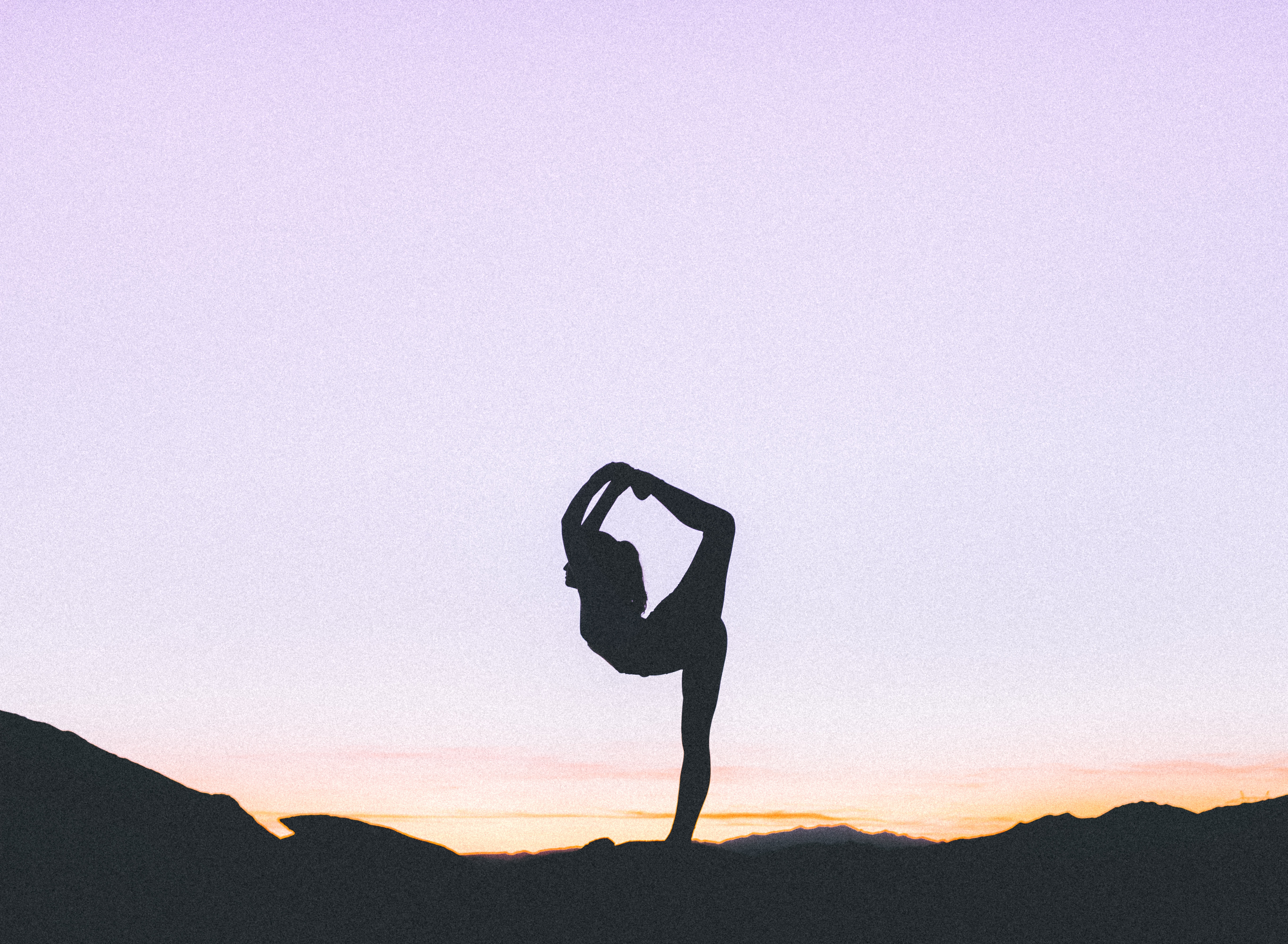 Woman posing on rock